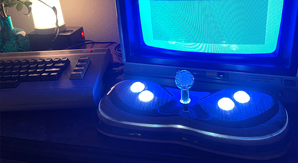 Photograph of a wooden video game joystick